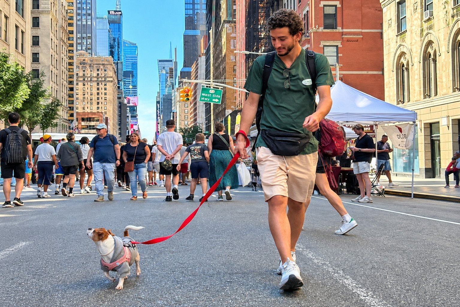 Kyle on a Chelsea street with a dog